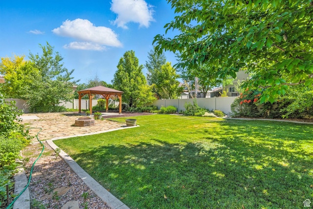 1221 S 130th St E, Payson, UT 84651 - fenced backyard with a gazebo, a patio area, and a fire pit