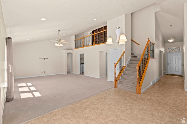 1221 S 130th St E, Payson, UT 84651 - unfurnished living room with high vaulted ceiling, a ceiling fan, stairway, recessed lighting, and arched walkways