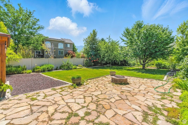 1221 S 130th St E, Payson, UT 84651 - fenced backyard with an outdoor fire pit and a patio area