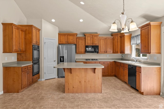 1221 S 130th St E, Payson, UT 84651 - kitchen with black appliances, vaulted ceiling, a chandelier, a center island, and light countertops
