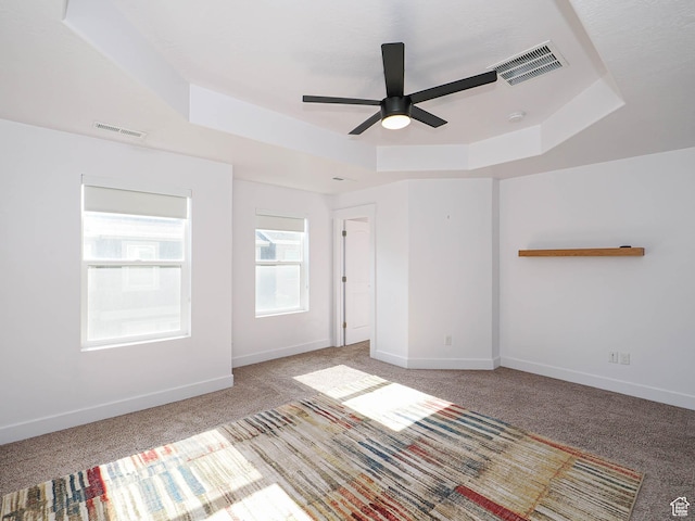 1792 W Dalmeny Way, Riverton, UT 84065 - spare room featuring a raised ceiling, ceiling fan, light carpet, and a smoke detector