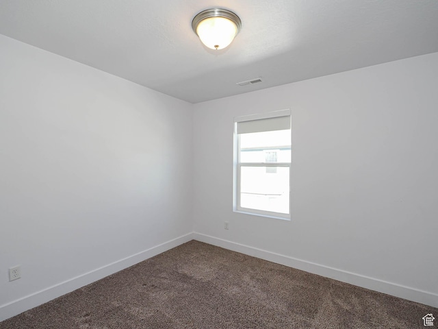 1792 W Dalmeny Way, Riverton, UT 84065 - spare room with dark carpet and baseboards