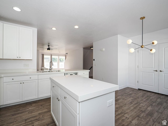 1792 W Dalmeny Way, Riverton, UT 84065 - kitchen featuring recessed lighting, dark wood-style flooring, light countertops, white cabinets, and a center island
