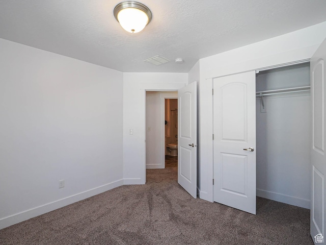 1792 W Dalmeny Way, Riverton, UT 84065 - unfurnished bedroom featuring dark colored carpet, a closet, and a textured ceiling