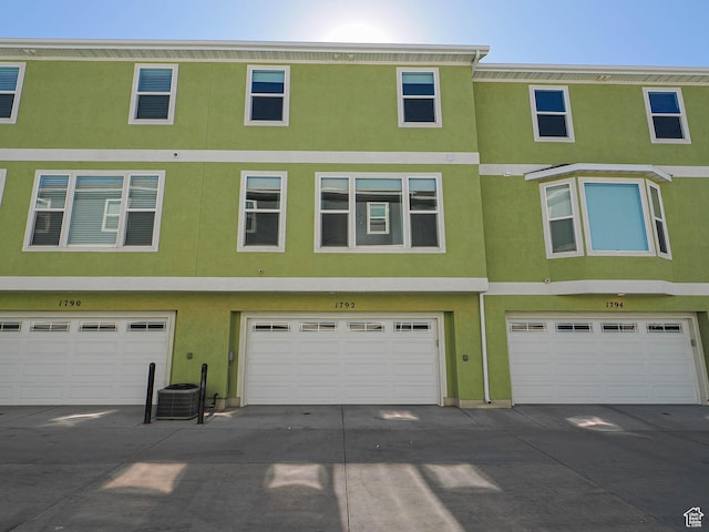 1792 W Dalmeny Way, Riverton, UT 84065 - view of front of property with stucco siding, a garage, and driveway