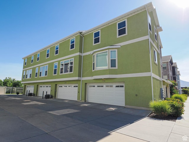 1792 W Dalmeny Way, Riverton, UT 84065 - view of property with a garage and driveway