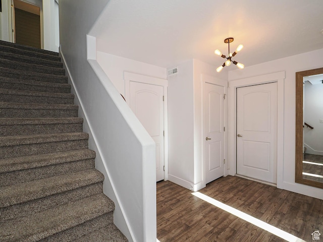 1792 W Dalmeny Way, Riverton, UT 84065 - stairs featuring a chandelier and wood finished floors