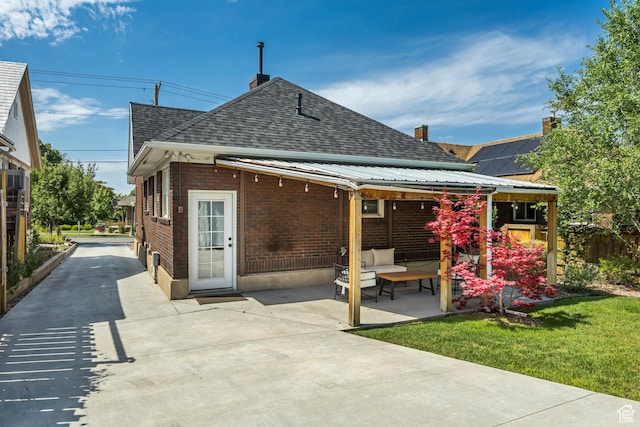 1381 E 1300 S, Salt Lake City, UT 84105 - rear view of property with a shingled roof, a patio, a chimney, and brick siding