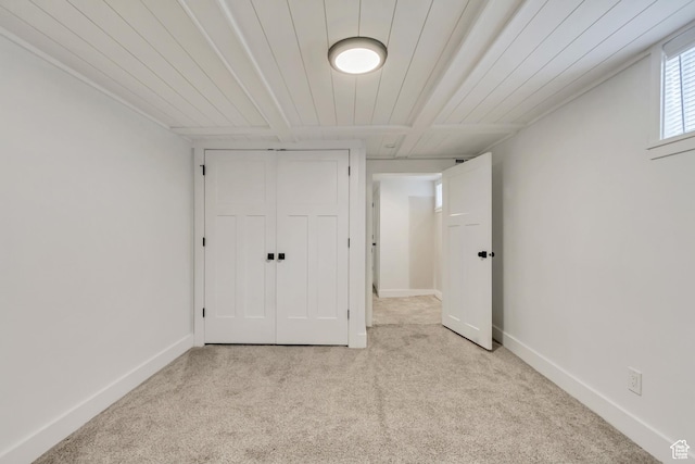 1381 E 1300 S, Salt Lake City, UT 84105 - unfurnished bedroom featuring light colored carpet, wood ceiling, and a closet