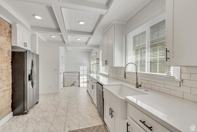 1381 E 1300 S, Salt Lake City, UT 84105 - kitchen with appliances with stainless steel finishes, beamed ceiling, backsplash, coffered ceiling, and white cabinetry