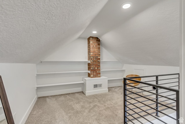 1381 E 1300 S, Salt Lake City, UT 84105 - additional living space with a textured ceiling, carpet flooring, and lofted ceiling