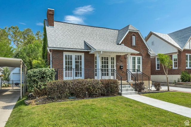 1381 E 1300 S, Salt Lake City, UT 84105 - view of front of house featuring a chimney, a front yard, and brick siding