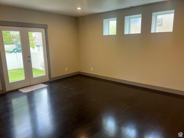 10337 S Wapati Moon Pl, South Jordan, UT 84095 - empty room with french doors, healthy amount of natural light, recessed lighting, and dark wood finished floors