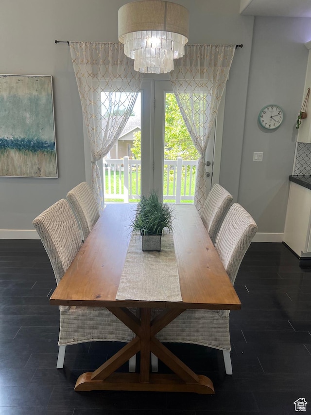 10337 S Wapati Moon Pl, South Jordan, UT 84095 - dining area with dark wood finished floors and a chandelier