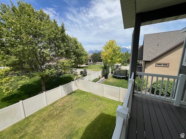 10337 S Wapati Moon Pl, South Jordan, UT 84095 - fenced backyard with a trampoline and a mountain view