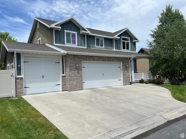 10337 S Wapati Moon Pl, South Jordan, UT 84095 - craftsman-style home featuring driveway, board and batten siding, and a garage