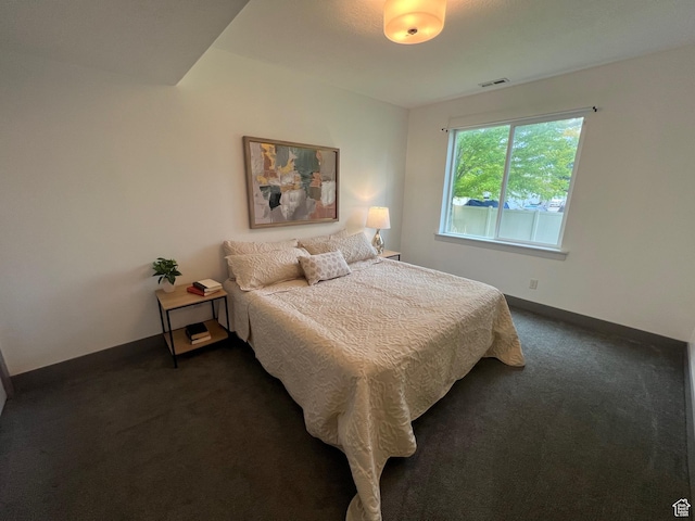 10337 S Wapati Moon Pl, South Jordan, UT 84095 - bedroom featuring dark colored carpet and baseboards