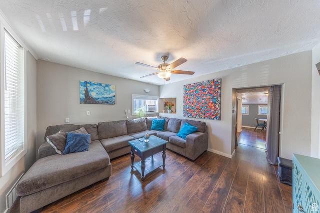 525 3rd St, Ogden, UT 84404 - living room with dark wood-type flooring, a textured ceiling, and ceiling fan