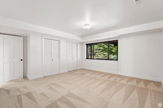 4307 Churchill Dr N Unit 97, Provo, UT 84604 - unfurnished bedroom featuring carpet flooring and two closets