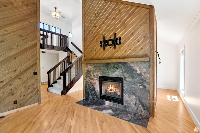 4307 Churchill Dr N Unit 97, Provo, UT 84604 - detailed view of wood finished floors, a fireplace with flush hearth, and a ceiling fan