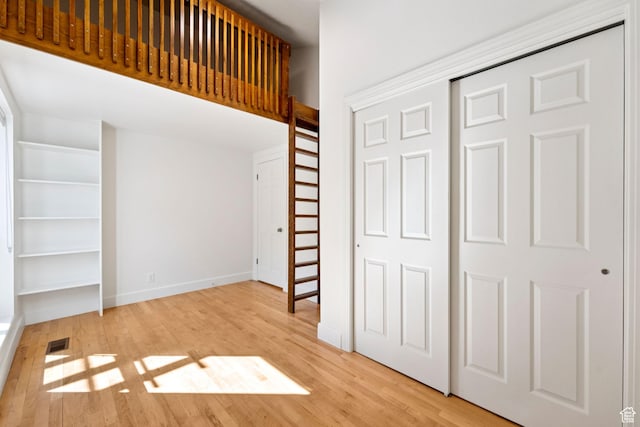 4307 Churchill Dr N Unit 97, Provo, UT 84604 - unfurnished bedroom with wood finished floors and a closet