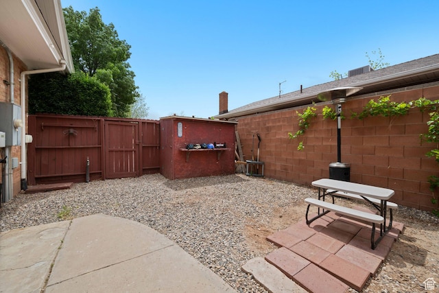 266 W 200 S, Hurricane, UT 84737 - fenced backyard with a gate and a patio area