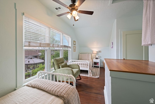 266 W 200 S, Hurricane, UT 84737 - bedroom with dark wood-style floors, vaulted ceiling, and a ceiling fan