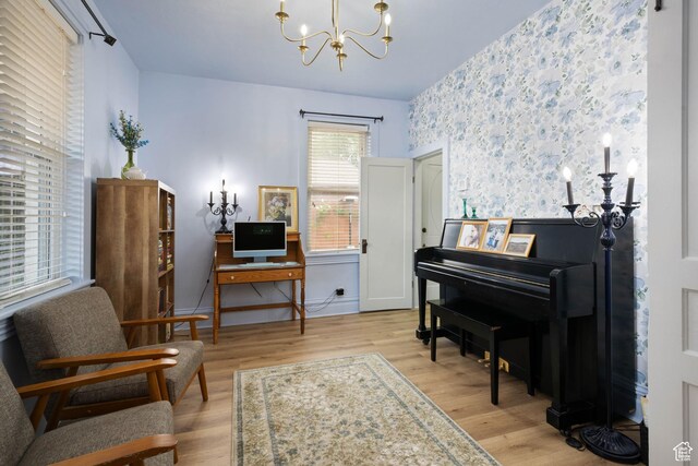 266 W 200 S, Hurricane, UT 84737 - living area featuring a chandelier, wallpapered walls, wood finished floors, and an accent wall