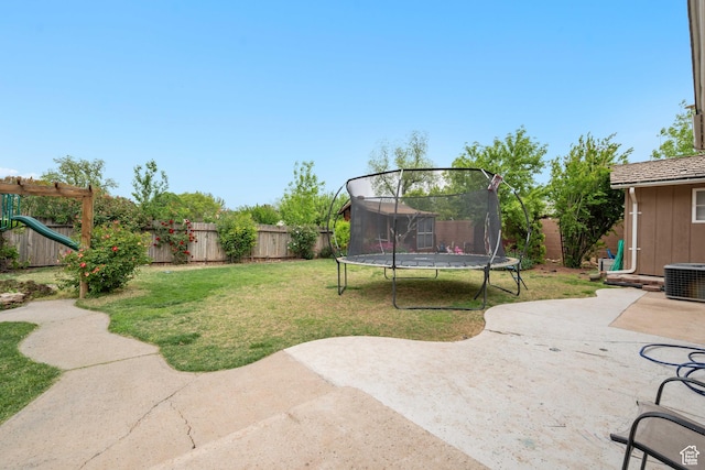 266 W 200 S, Hurricane, UT 84737 - fenced backyard featuring a trampoline, a patio area, and a playground