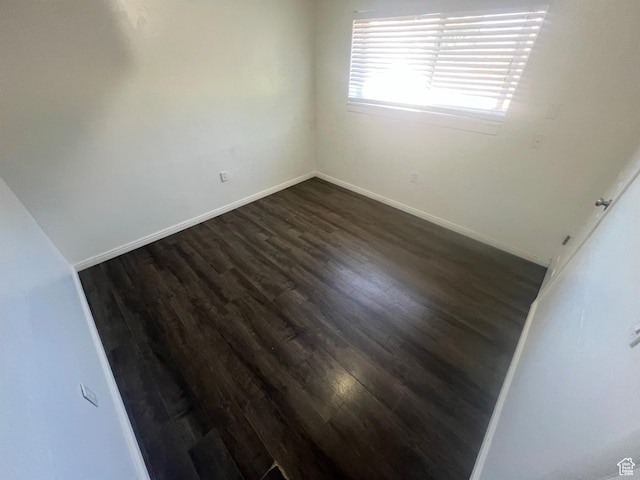 1128 W 600 N, Orem, UT 84057 - spare room featuring dark wood finished floors and baseboards