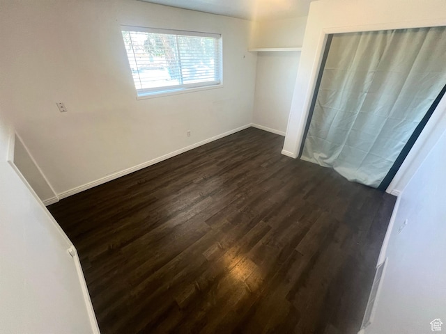 1128 W 600 N, Orem, UT 84057 - unfurnished bedroom featuring dark wood-style floors and baseboards