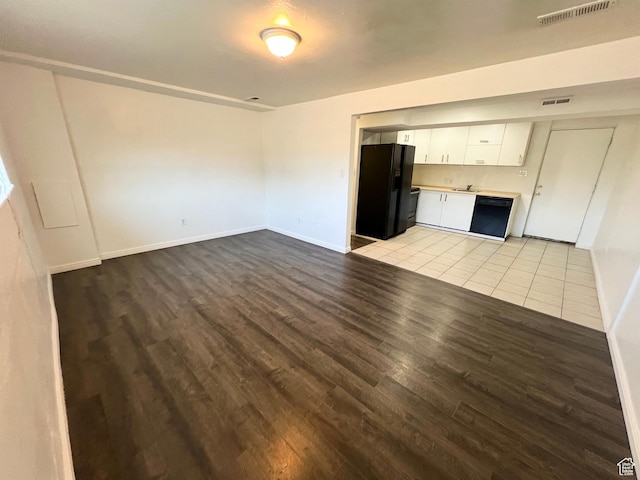 1128 W 600 N, Orem, UT 84057 - unfurnished living room with wood finished floors and baseboards