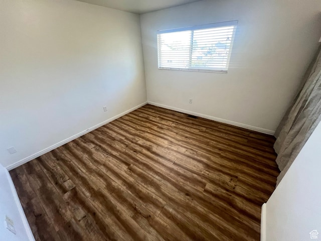 1128 W 600 N, Orem, UT 84057 - unfurnished room featuring dark wood-style flooring and baseboards