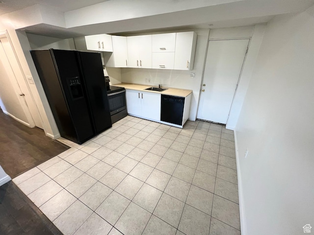 1128 W 600 N, Orem, UT 84057 - kitchen featuring black appliances, light countertops, light tile patterned flooring, and white cabinets