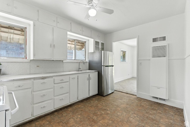 175 S 200 E, Payson, UT 84651 - kitchen with freestanding refrigerator, a heating unit, a ceiling fan, and white cabinetry