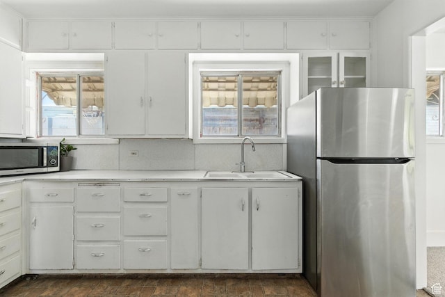 175 S 200 E, Payson, UT 84651 - kitchen featuring stainless steel appliances, light countertops, and white cabinets
