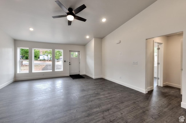 1191 Wagner Ave, Moab, UT 84532 - unfurnished living room featuring ceiling fan, dark wood-style flooring, vaulted ceiling, and recessed lighting