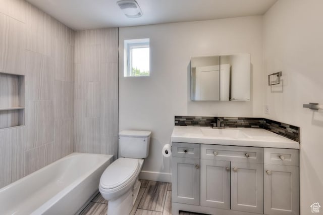 1191 Wagner Ave, Moab, UT 84532 - bathroom with vanity, backsplash, wood finished floors, and shower / tub combination