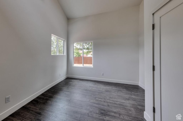 1191 Wagner Ave, Moab, UT 84532 - spare room with baseboards and dark wood-type flooring