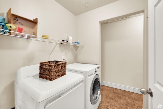 8264 S Resaca Dr Unit K9, Sandy, UT 84070 - washroom featuring washer and clothes dryer and baseboards