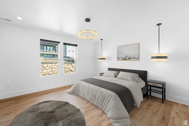 5488 N Valley Rd E, Lehi, UT 84043 - bedroom with wood finished floors and recessed lighting