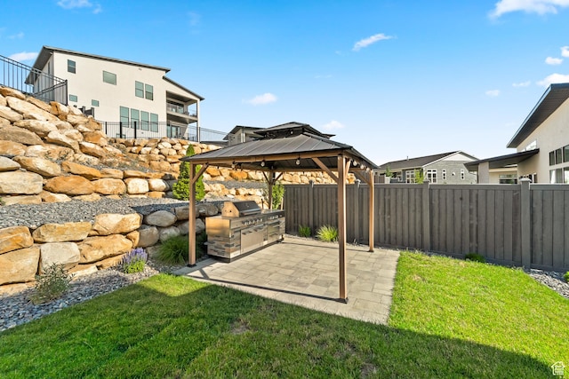 5488 N Valley Rd E, Lehi, UT 84043 - view of yard featuring a gazebo, a patio area, and an outdoor kitchen