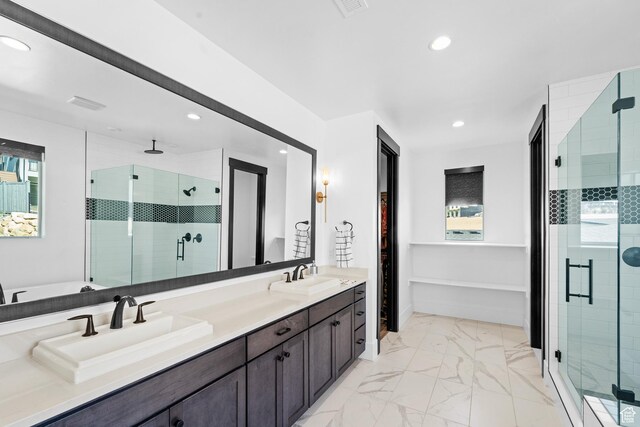 5488 N Valley Rd E, Lehi, UT 84043 - bathroom featuring a stall shower, marble finish flooring, recessed lighting, and double vanity