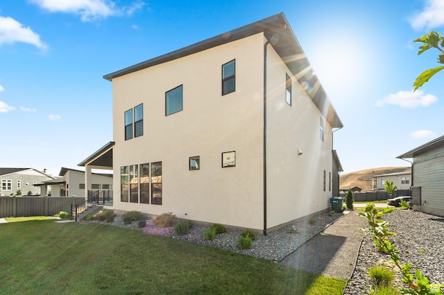 5488 N Valley Rd E, Lehi, UT 84043 - rear view of property with stucco siding