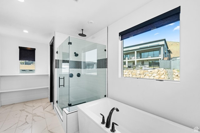 5488 N Valley Rd E, Lehi, UT 84043 - bathroom featuring a tub to relax in, a stall shower, marble finish floors, and recessed lighting