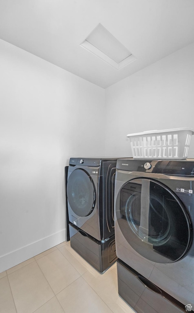 5488 N Valley Rd E, Lehi, UT 84043 - washroom featuring washer and clothes dryer, attic access, and tile patterned flooring