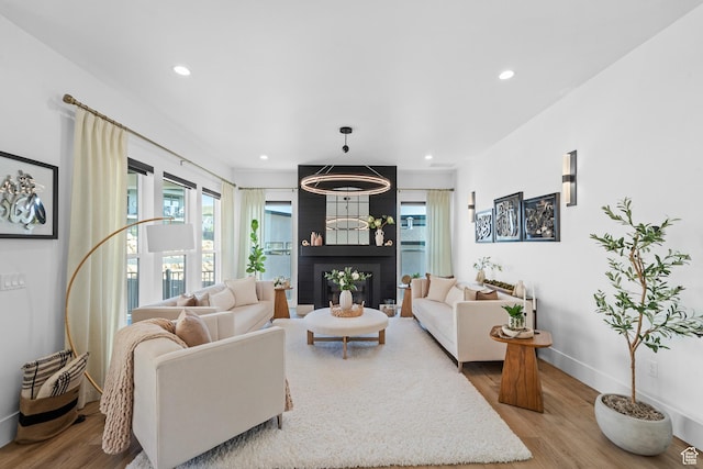 5488 N Valley Rd E, Lehi, UT 84043 - living room featuring wood finished floors and recessed lighting