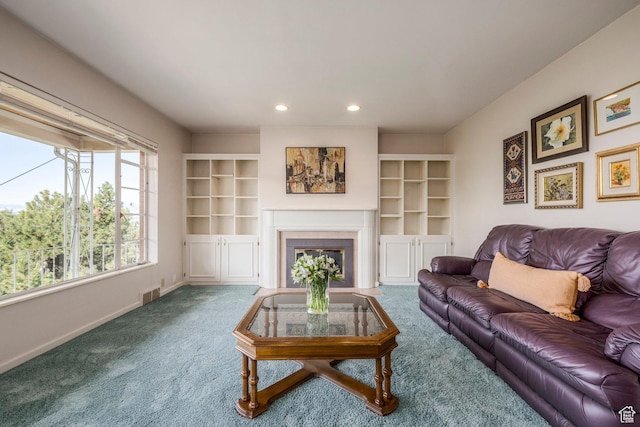420 E 12th Ave, Salt Lake City, UT 84103 - carpeted living room featuring recessed lighting and a glass covered fireplace