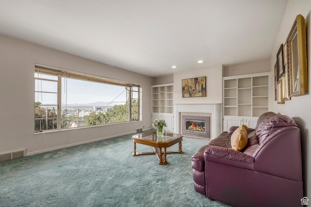 420 E 12th Ave, Salt Lake City, UT 84103 - living room featuring plenty of natural light, carpet, a tiled fireplace, and recessed lighting