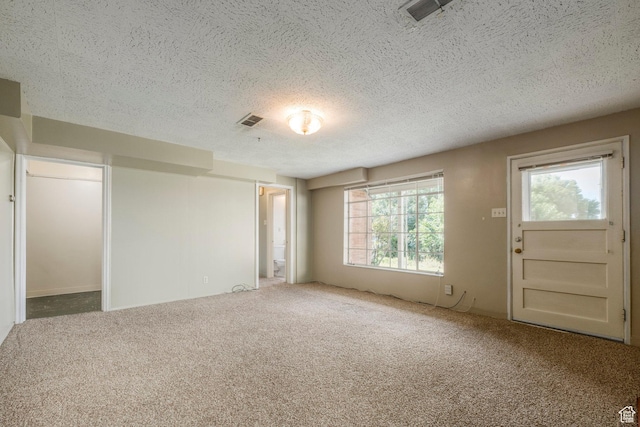420 E 12th Ave, Salt Lake City, UT 84103 - carpeted foyer entrance featuring a textured ceiling